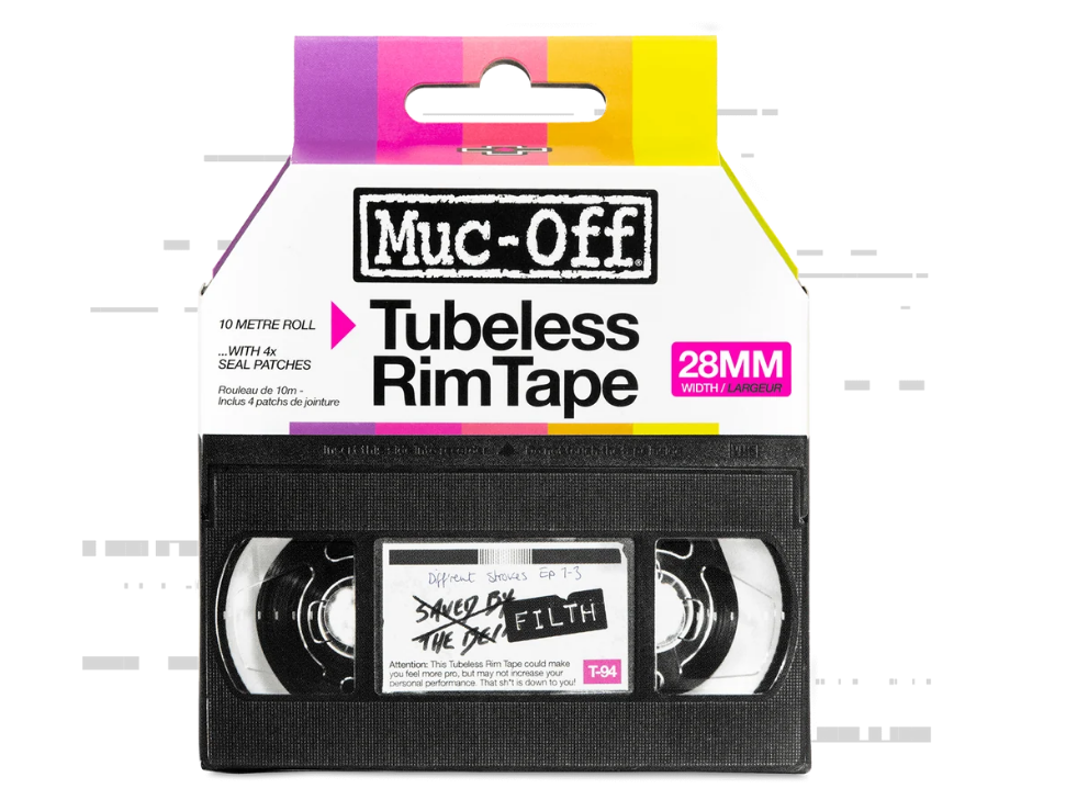 Muc-Off 28mm x 10m pink tubeless rim tape roll with seal patches.